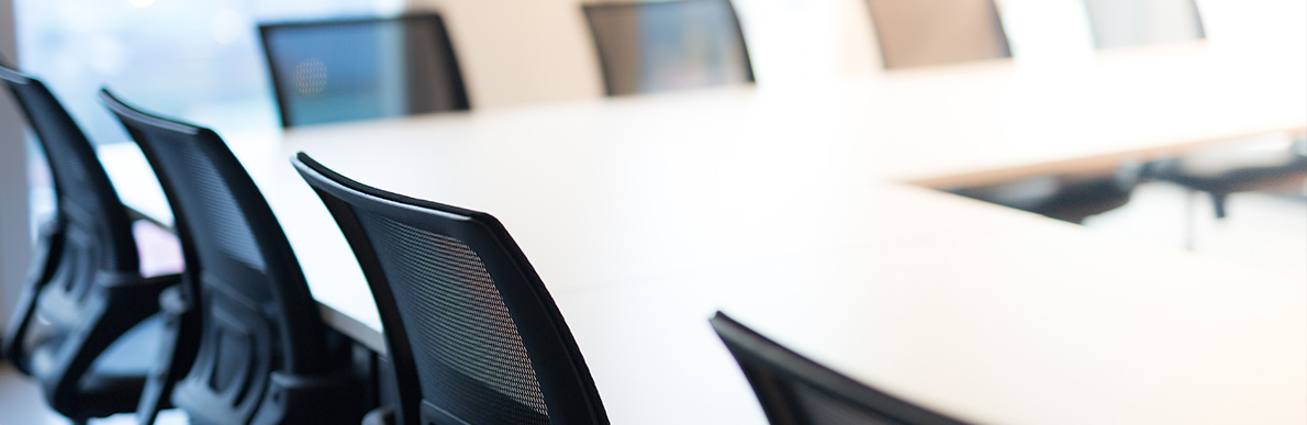 Chairs around a meeting room table